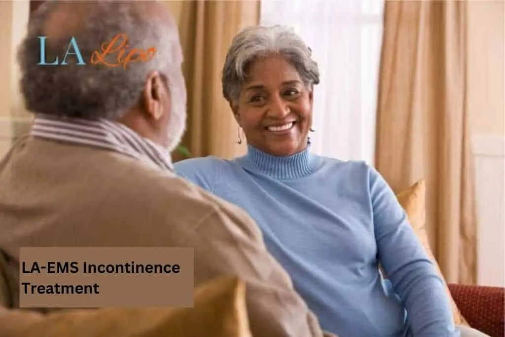 Couple sat smiling at each other - LA-EMS treatment Hyde Park Corner